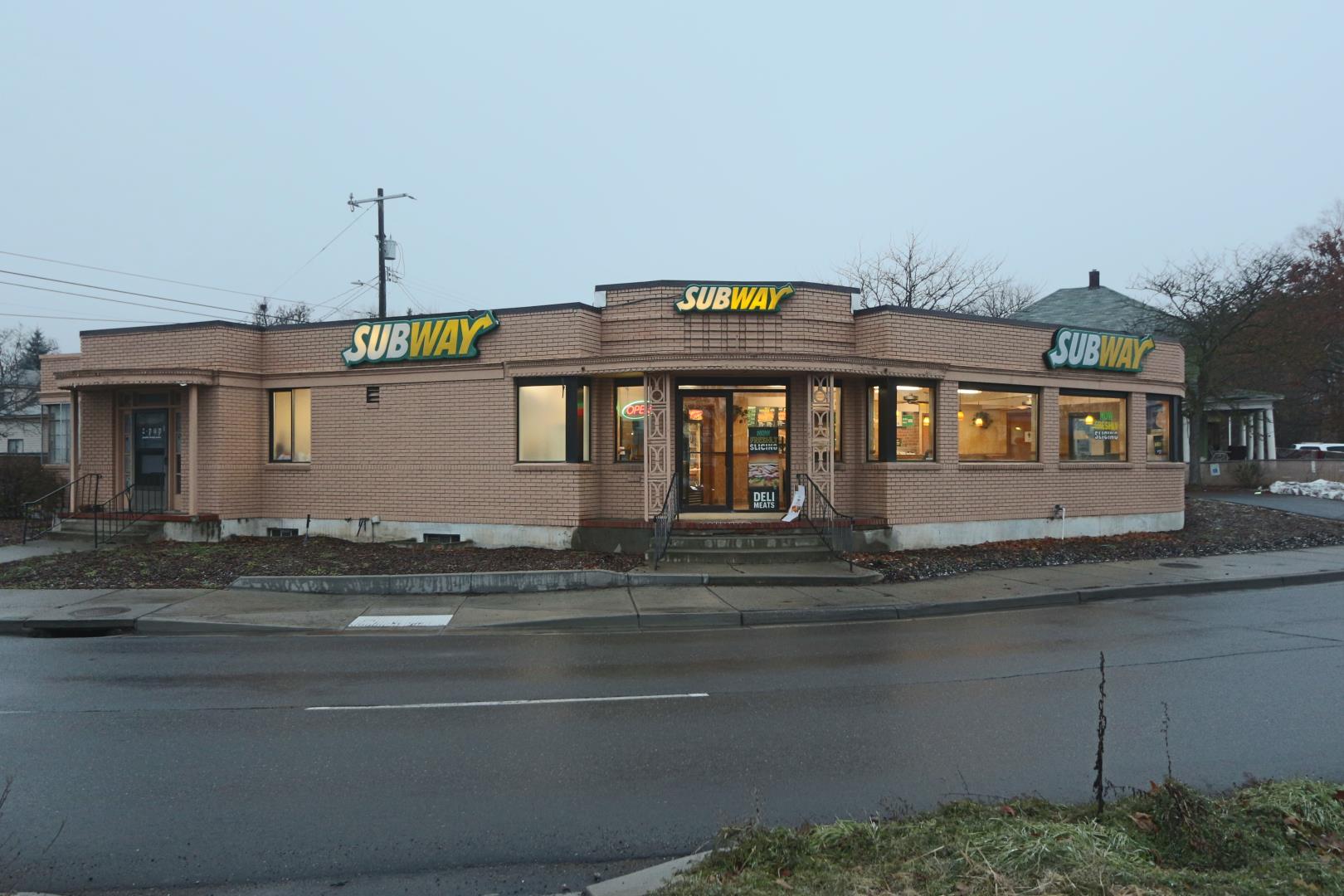 Current use is a Subway Restaurant. Brick building on corner lot. 12 surface car park spaces. All furnishing and equipment included at no additional value. Nearly half of building is un-occupied plus a partial basement. Zoning is CB-55. 19,800 historic traffic count. Priced well under assessed value of $454,300. Assessor shows 2,705 sqft on main level.